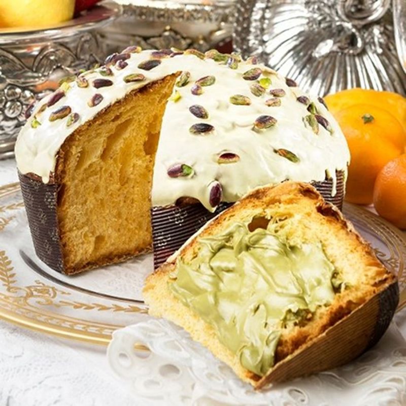 Traditional and delicious cake with Sicilian Pistachios in a red tin By D&G.