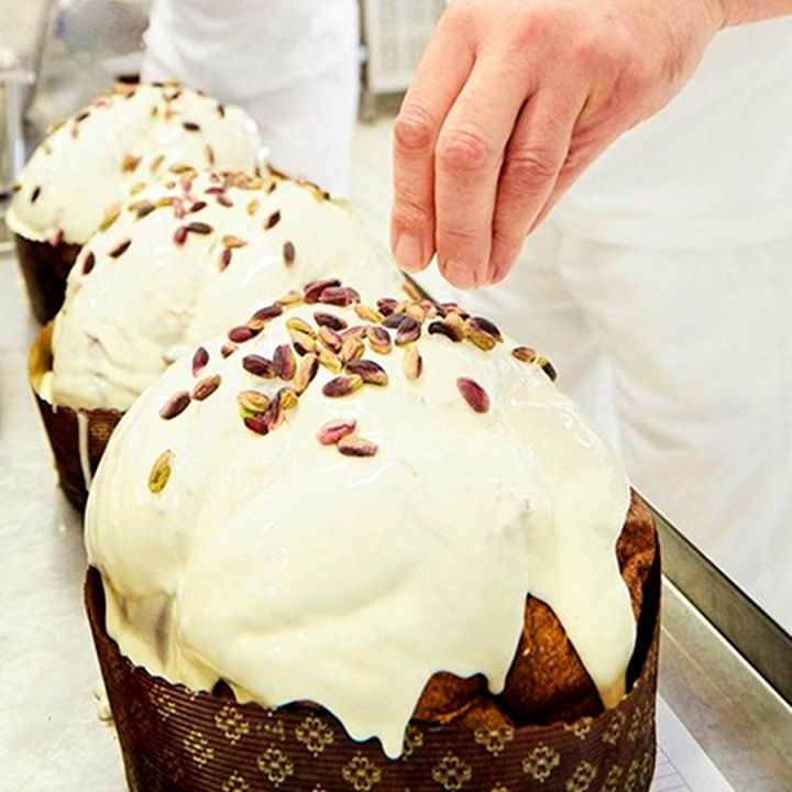 Traditional and delicious cake with Sicilian Pistachios in a red tin By D&G.