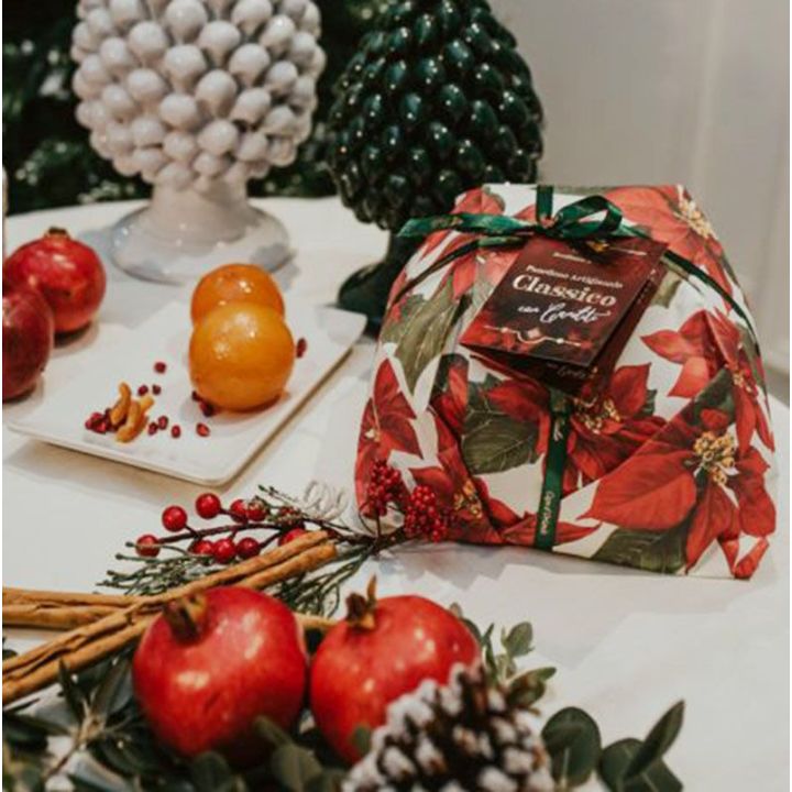 Artisan panettone with candied citrus fruits, raisins and almonds