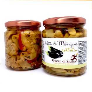 Delicious canned aubergines, cut into strips and Sicilian seasoned