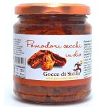 Dried tomatoes in oil flavored with garlic and basil