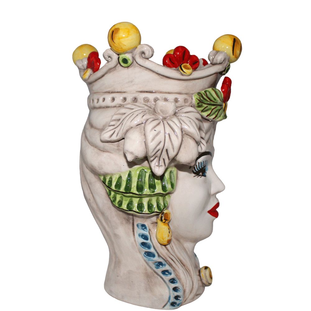 The queen decorated with colorful fruit and flowers, Sicilian ceramic from Caltagirone