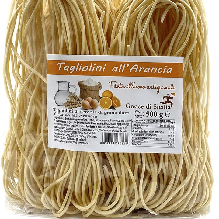 Homemade spaghetti alla chitarra flavored with orange
