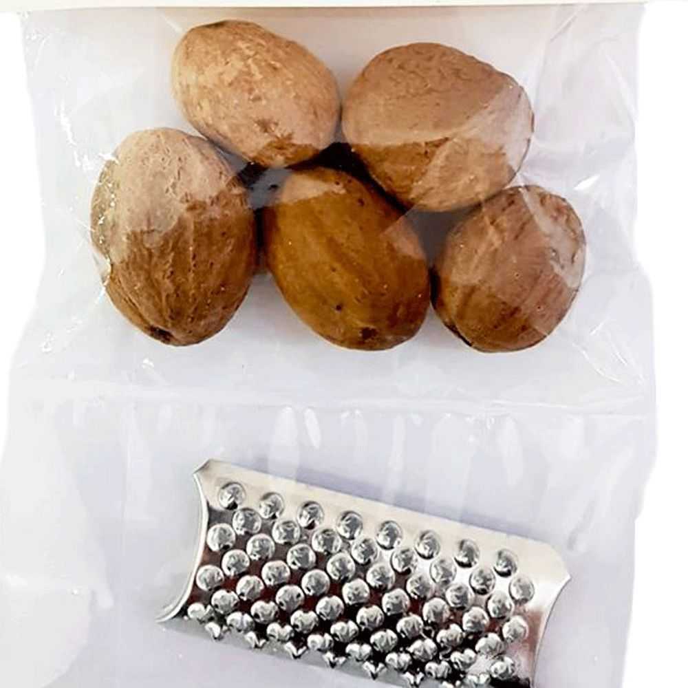 Five whole nutmegs to be grated and mini grater as a gift