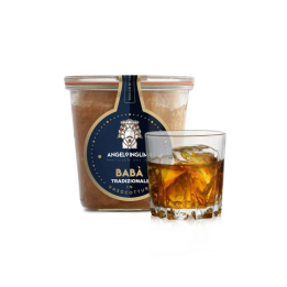 The soft dough of the traditional jar-cooked baba with rum - Inglima