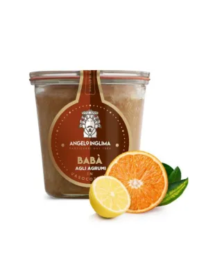 Il soffice impasto del Babà in vasocottura aromatizzati agli agrumi