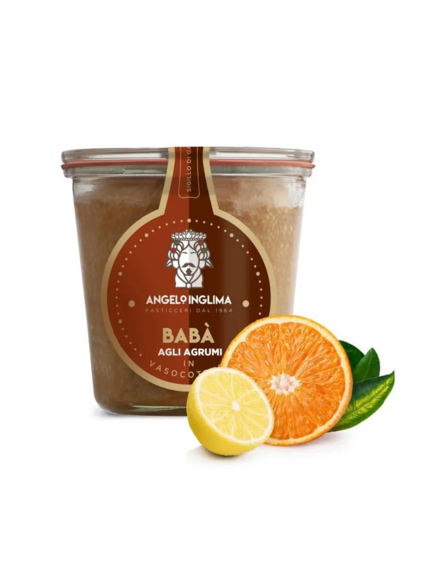 Il soffice impasto del Babà in vasocottura aromatizzati agli agrumi