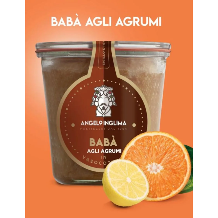The soft dough of Babà in jar cooking flavored with citrus fruits