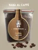 The soft dough of the traditional jar-cooked baba with Coffee - Inglima